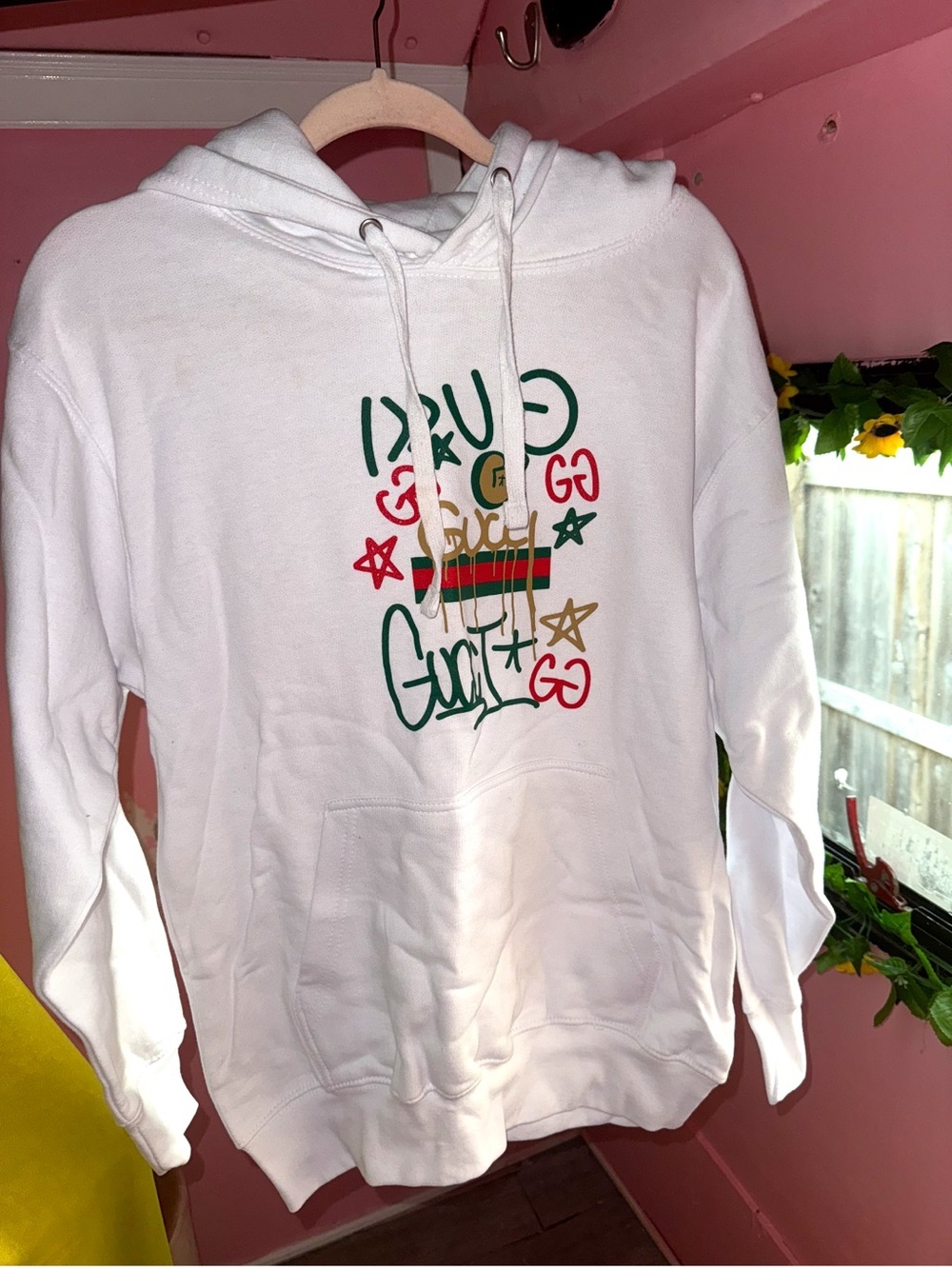 White Graphic Hoodie with Green & Red Accents